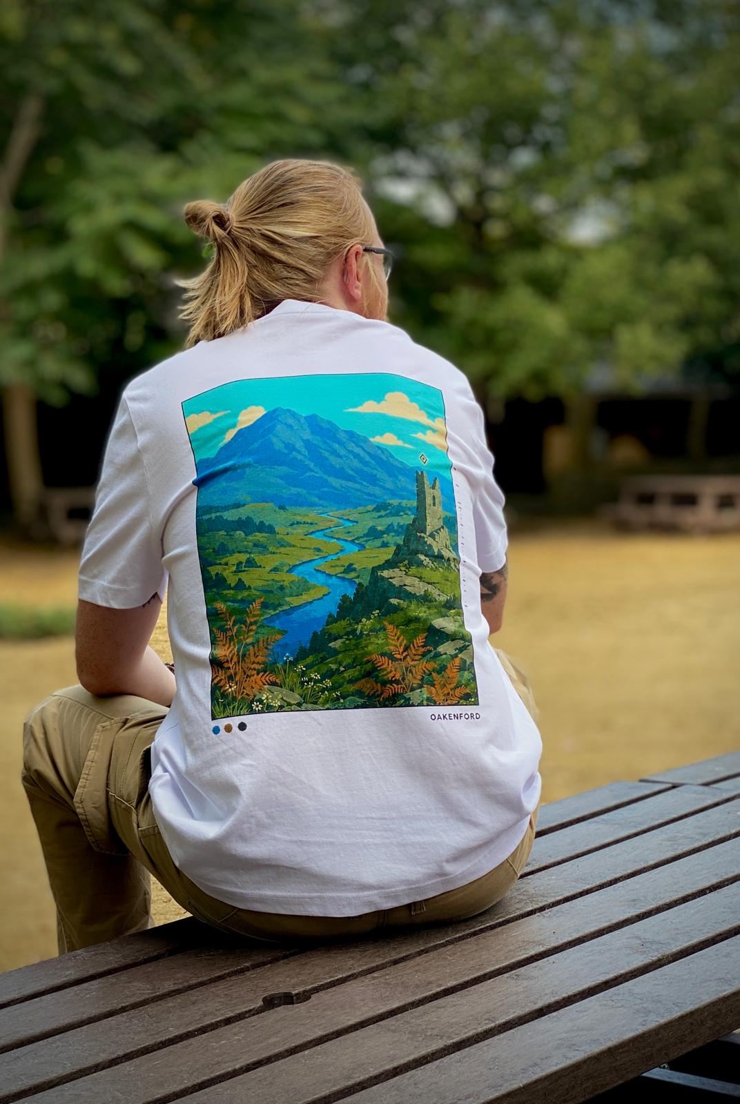 The Overlook white T-shirt being worn, showing its back artwork