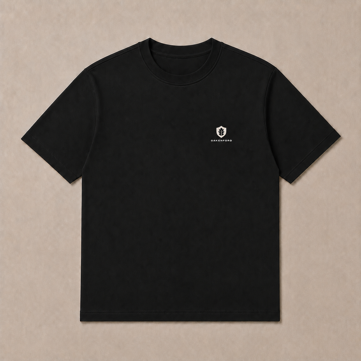 Front of a black Oakenford T-shirt with small logo