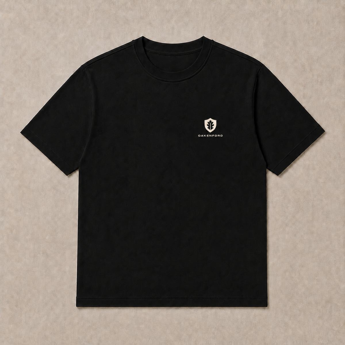 Front of a black Oakenford T-shirt with small logo