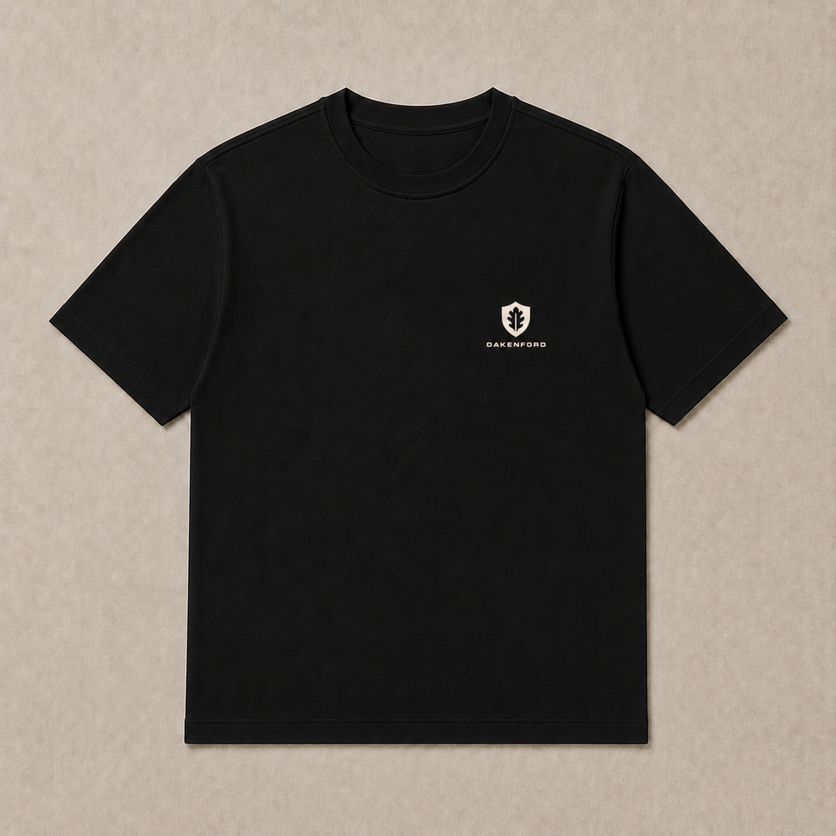 Front of a black Oakenford T-shirt with small logo