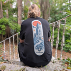 Model wearing the Fallen Tower Oakenford graphic T-shirt