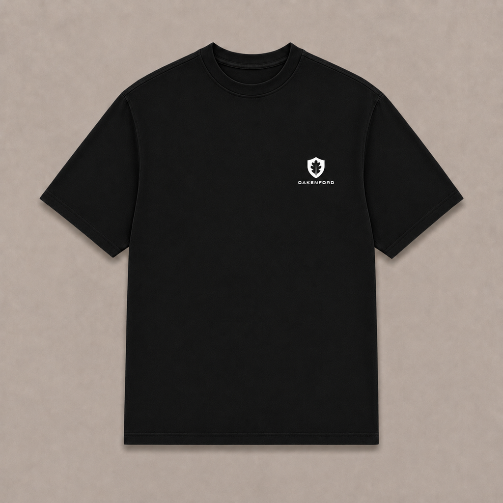 Front of a black Oakenford T-shirt with small logo