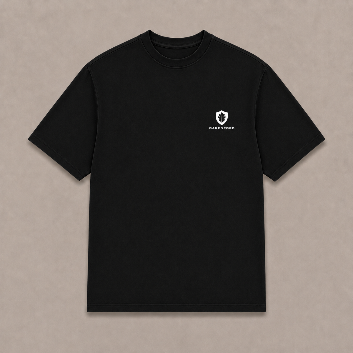 Front of a black Oakenford T-shirt with small logo