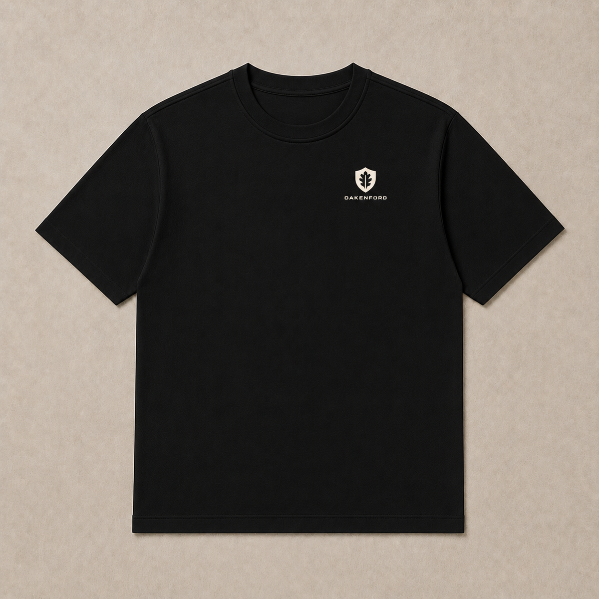 Front of a black Oakenford T-shirt with small logo